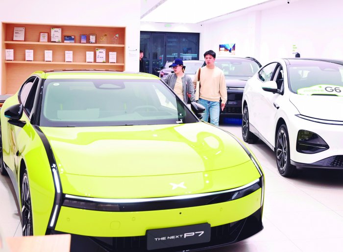 新能源汽车购置税政策调整在即 车市消费热度持续上升  第1张